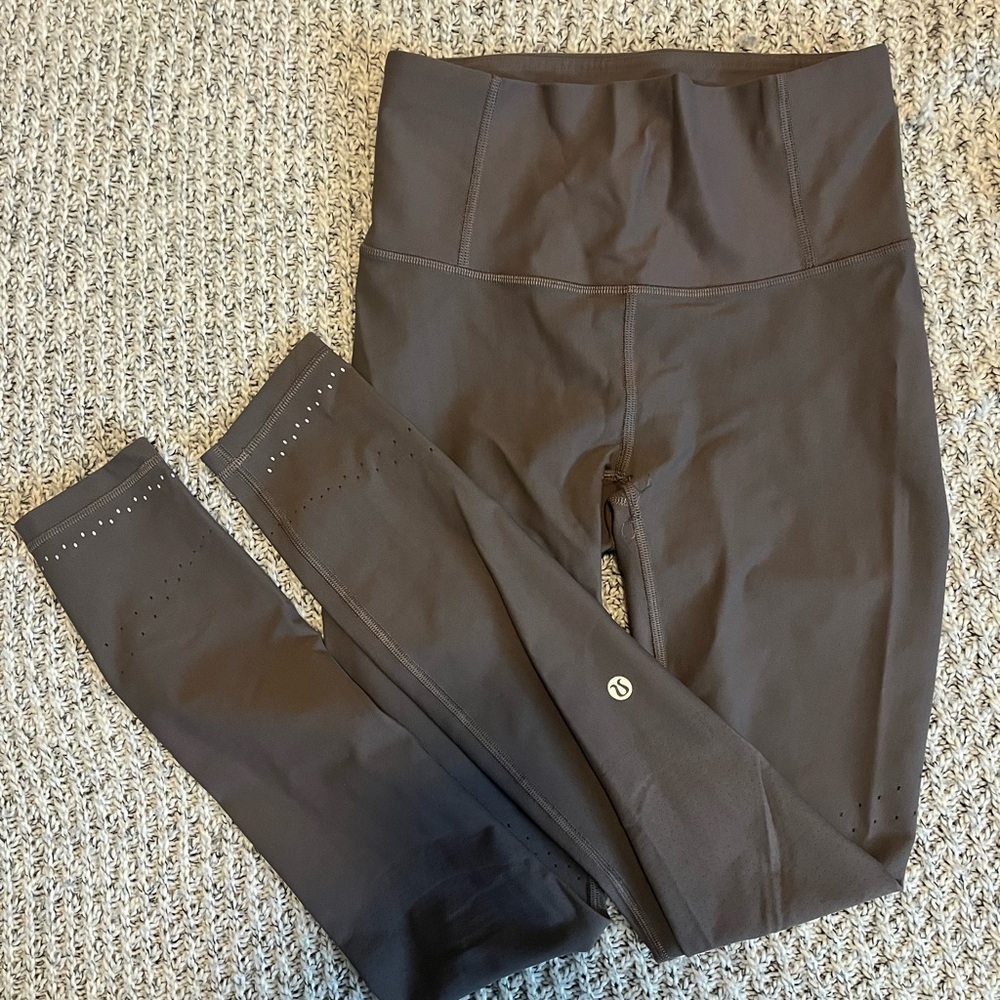 Lululemon zoned in tight leggings size 6 in color moonphase purple